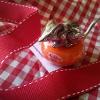 Intricately sculptured pewter cheesemouse on Babybelle Cheese, wrapped in red gingham check