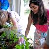 Monika planting carefully - watch those anaconda worms!